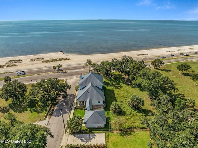 aerial view featuring a water view and a view of the beach