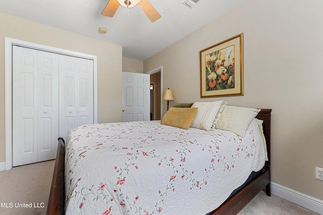 211 Demontluzin Ave, Bay Saint Louis, MS 39520 - carpeted bedroom with a closet, baseboards, and ceiling fan