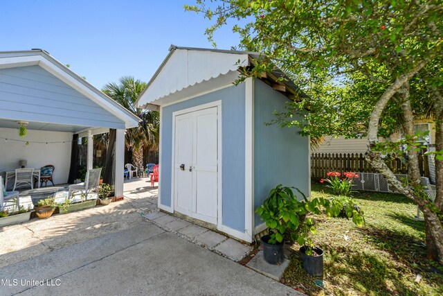 211 Demontluzin Ave, Bay Saint Louis, MS 39520 - view of shed with fence