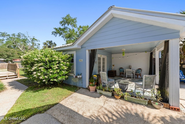 211 Demontluzin Ave, Bay Saint Louis, MS 39520 - view of patio featuring french doors