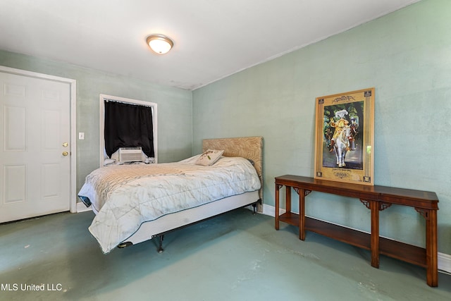 211 Demontluzin Ave, Bay Saint Louis, MS 39520 - bedroom featuring concrete flooring