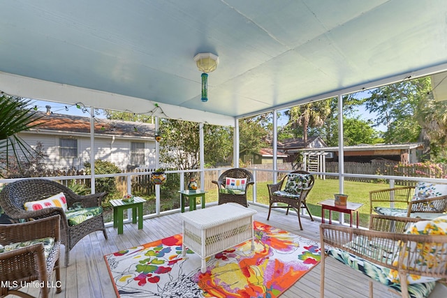 211 Demontluzin Ave, Bay Saint Louis, MS 39520 - sunroom featuring an outdoor living space and healthy amount of natural light