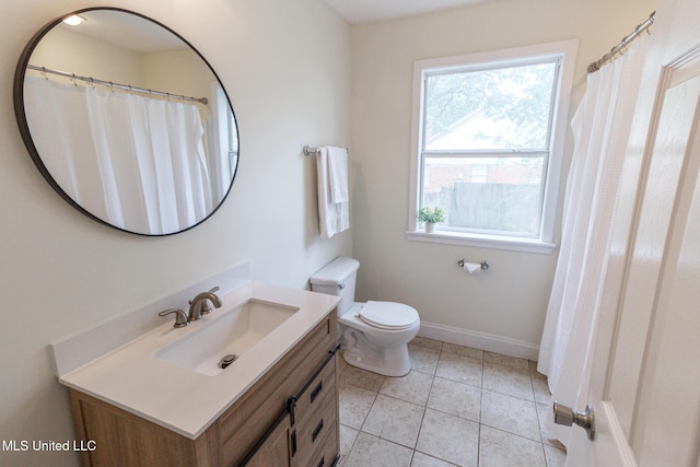 full bathroom featuring baseboards, tile patterned flooring, vanity, and toilet