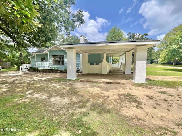 708 Lee Ave, Crystal Springs, MS 39059 - view of front of property with a chimney