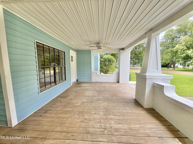708 Lee Ave, Crystal Springs, MS 39059 - wooden porch featuring a ceiling fan