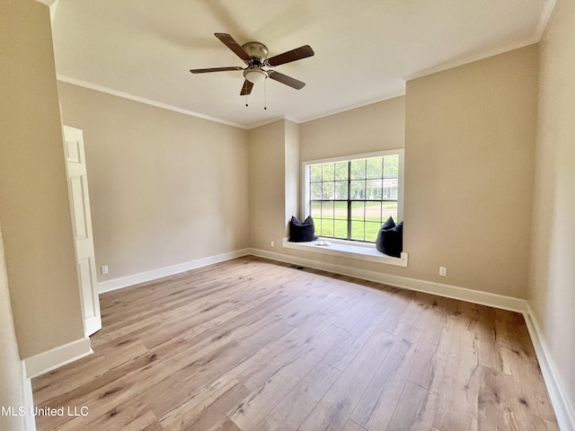 708 Lee Ave, Crystal Springs, MS 39059 - empty room with wood finished floors, ceiling fan, and crown molding