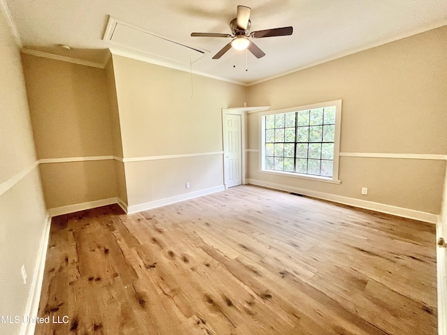 708 Lee Ave, Crystal Springs, MS 39059 - spare room featuring attic access, wood finished floors, ceiling fan, and ornamental molding