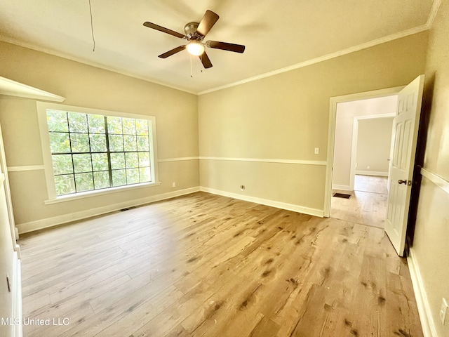 708 Lee Ave, Crystal Springs, MS 39059 - unfurnished room with light wood-style flooring, crown molding, and ceiling fan