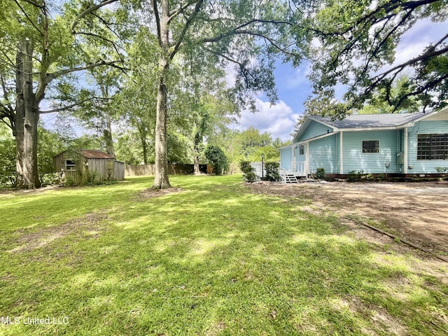 708 Lee Ave, Crystal Springs, MS 39059 - view of yard featuring an outdoor structure