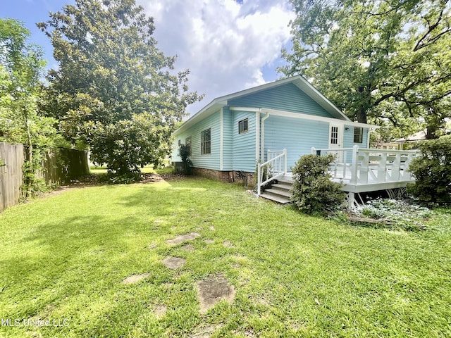 708 Lee Ave, Crystal Springs, MS 39059 - back of house with a wooden deck