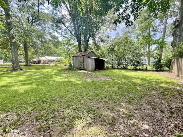 708 Lee Ave, Crystal Springs, MS 39059 - view of yard with an outbuilding and an outdoor structure
