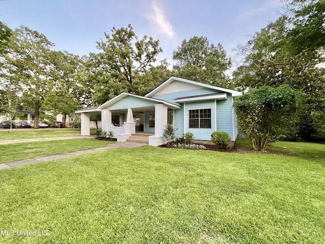 708 Lee Ave, Crystal Springs, MS 39059 - view of front of home with a porch and a front yard