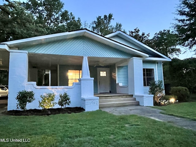 708 Lee Ave, Crystal Springs, MS 39059 - view of front facade with covered porch and a front yard