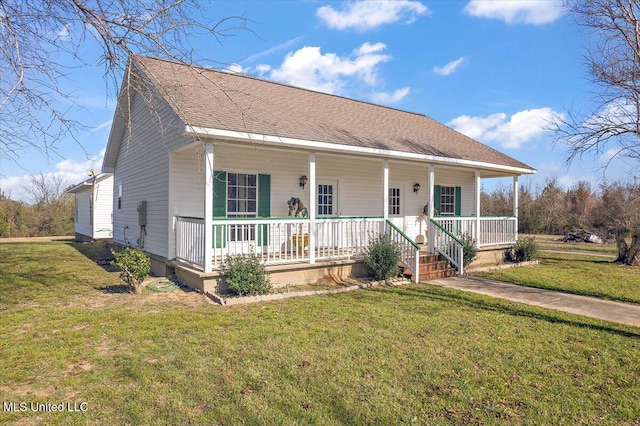 view of front of home with a porch and a front yard