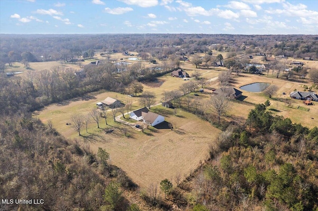 birds eye view of property featuring a rural view