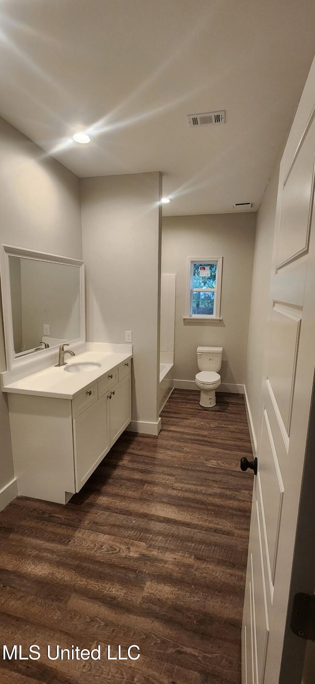 233 Allstate Dr, Jackson, MS 39211 - bathroom with vanity and wood finished floors