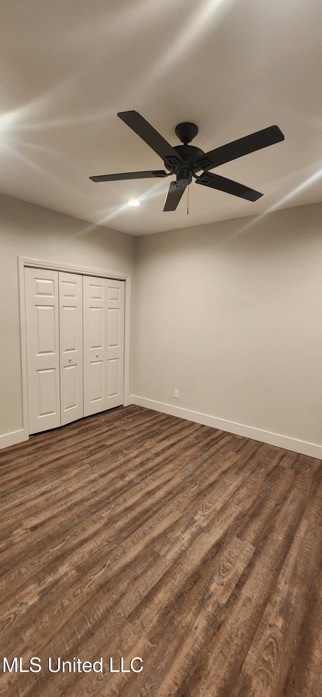 233 Allstate Dr, Jackson, MS 39211 - unfurnished bedroom featuring dark wood finished floors, a closet, and a ceiling fan