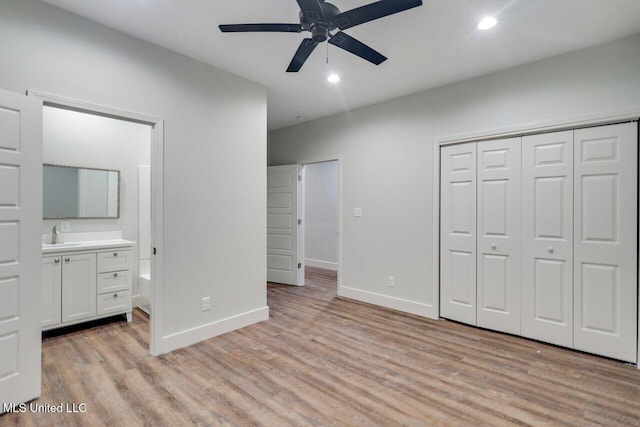 233 Allstate Dr, Jackson, MS 39211 - unfurnished bedroom featuring light wood-style floors, recessed lighting, a closet, connected bathroom, and ceiling fan