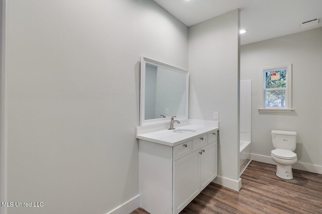 233 Allstate Dr, Jackson, MS 39211 - bathroom with vanity, wood finished floors, and recessed lighting