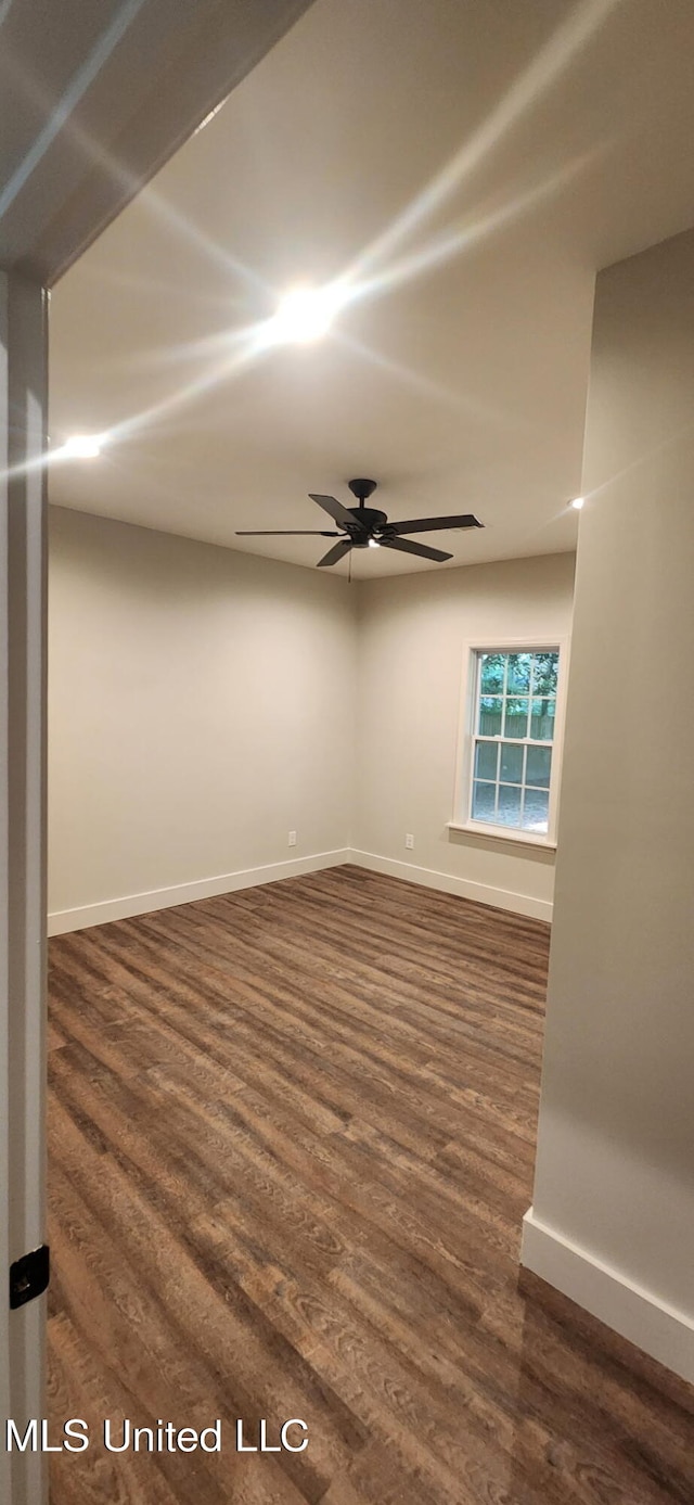 233 Allstate Dr, Jackson, MS 39211 - unfurnished room with dark wood-type flooring and ceiling fan