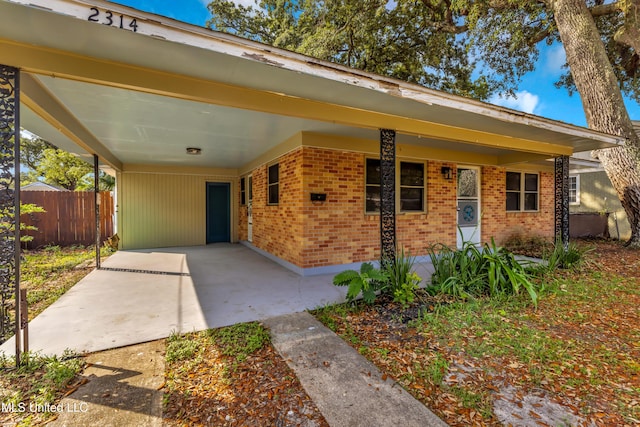 2314 Curcor Dr, Gulfport, MS 39507 - view of front of property with brick siding and an attached carport