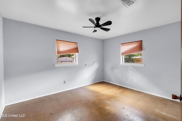 2314 Curcor Dr, Gulfport, MS 39507 - unfurnished room featuring baseboards and a ceiling fan