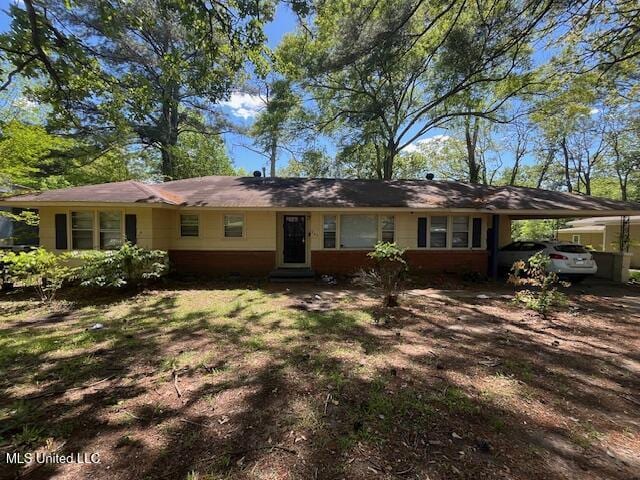 245 Shady Cir, Jackson, MS 39204 - view of front of home featuring entry steps and an attached carport