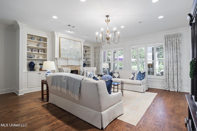 living area featuring recessed lighting, baseboards, visible vents, and an inviting chandelier