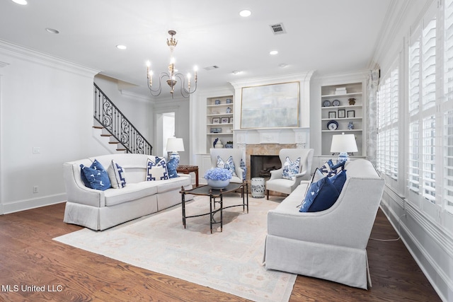 living room with visible vents, baseboards, and plenty of natural light