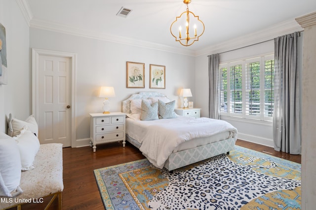 bedroom with visible vents, crown molding, dark wood-style flooring, baseboards, and a chandelier