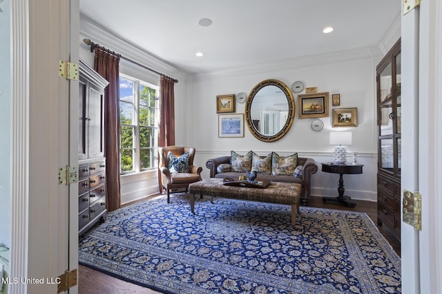 living area with recessed lighting, baseboards, ornamental molding, and wood finished floors