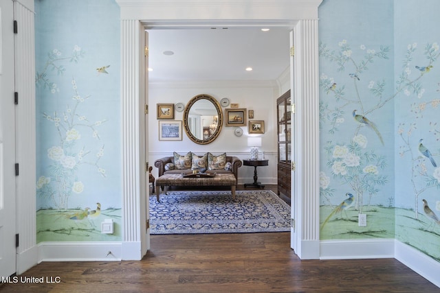 interior space with crown molding and wood finished floors