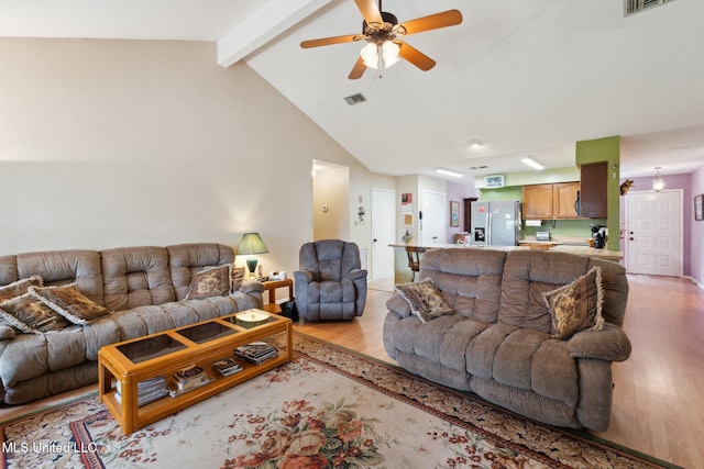 6944 Apona St, Diamondhead, MS 39525 - living area featuring light wood-type flooring and a ceiling fan