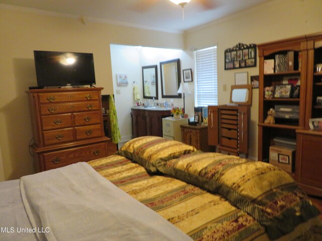 bedroom with crown molding