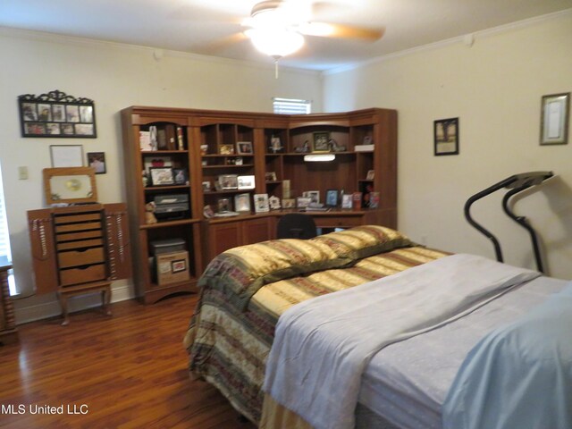 bedroom featuring ceiling fan, crown molding, and dark wood-type flooring