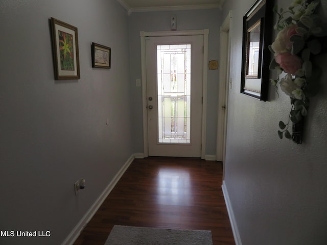 entryway featuring dark wood-style floors, baseboards, and ornamental molding