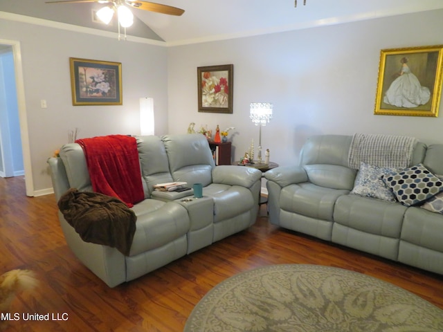 living area featuring vaulted ceiling, baseboards, a ceiling fan, and wood finished floors