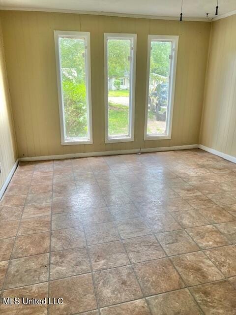 3916 Oakhill Dr, Jackson, MS 39206 - empty room with crown molding and wood walls