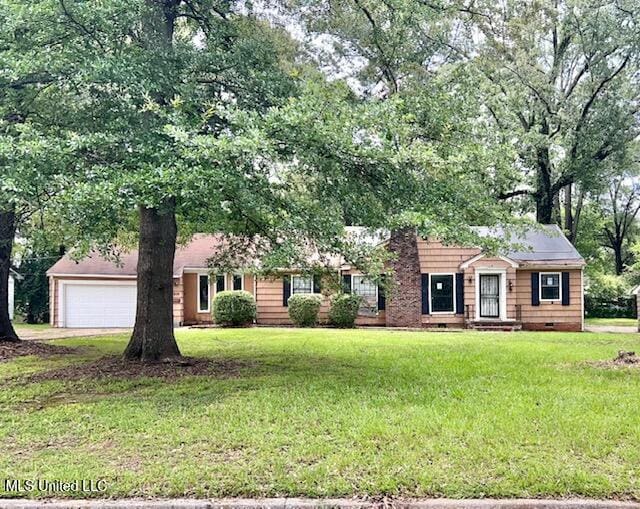 3916 Oakhill Dr, Jackson, MS 39206 - ranch-style home with a front yard, a garage, and concrete driveway