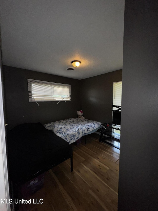 710 Benning Rd, Jackson, MS 39206 - bedroom featuring wood finished floors