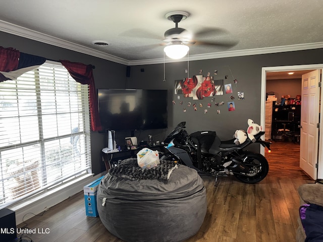 710 Benning Rd, Jackson, MS 39206 - living area with ceiling fan, wood finished floors, and crown molding