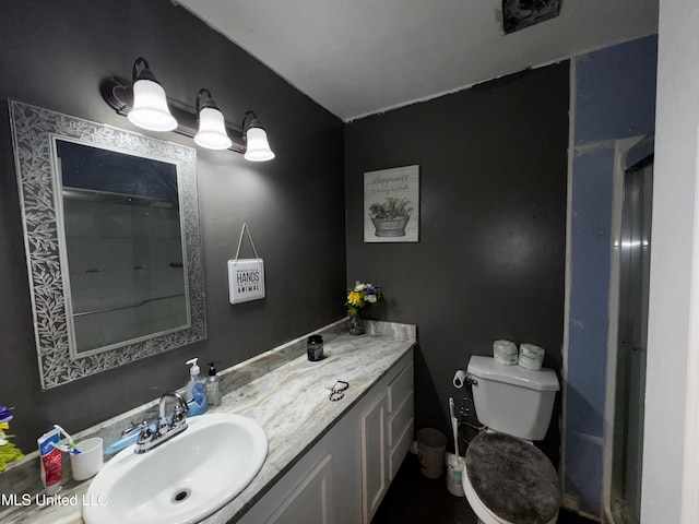 710 Benning Rd, Jackson, MS 39206 - bathroom featuring vanity and toilet