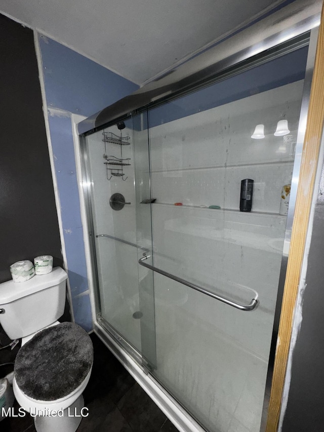 710 Benning Rd, Jackson, MS 39206 - bathroom with a shower stall and toilet