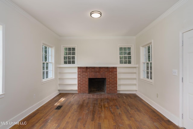 unfurnished living room with dark wood-style flooring, a fireplace, visible vents, and baseboards