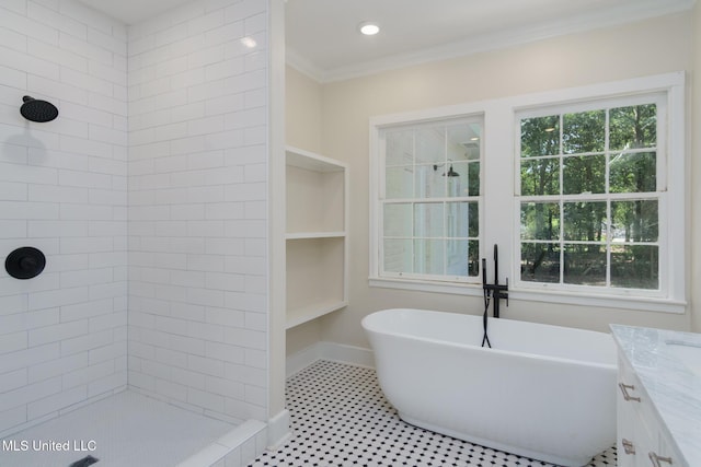 bathroom with a healthy amount of sunlight, a freestanding bath, crown molding, and tiled shower