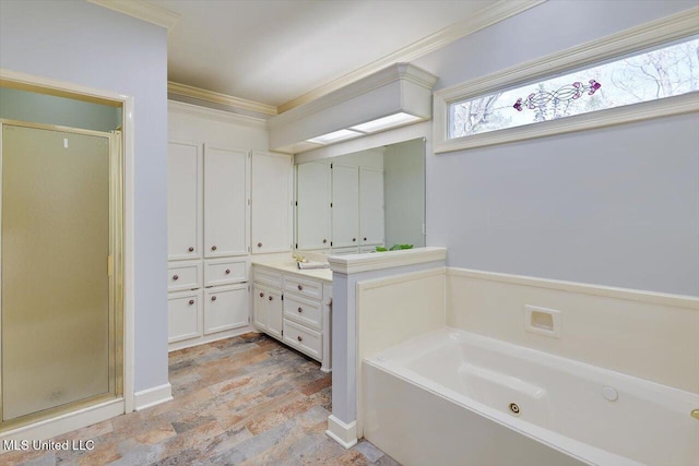 bathroom featuring vanity, a shower stall, a bath, and crown molding