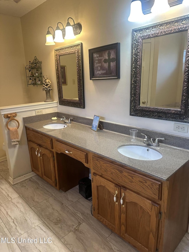 5875 White Ridge Cir W, Olive Branch, MS 38654 - full bath with double vanity and marble look tile flooring