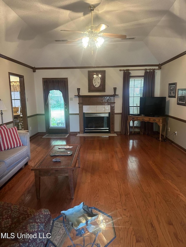 5875 White Ridge Cir W, Olive Branch, MS 38654 - living area featuring crown molding, vaulted ceiling, ceiling fan, a high end fireplace, and plenty of natural light
