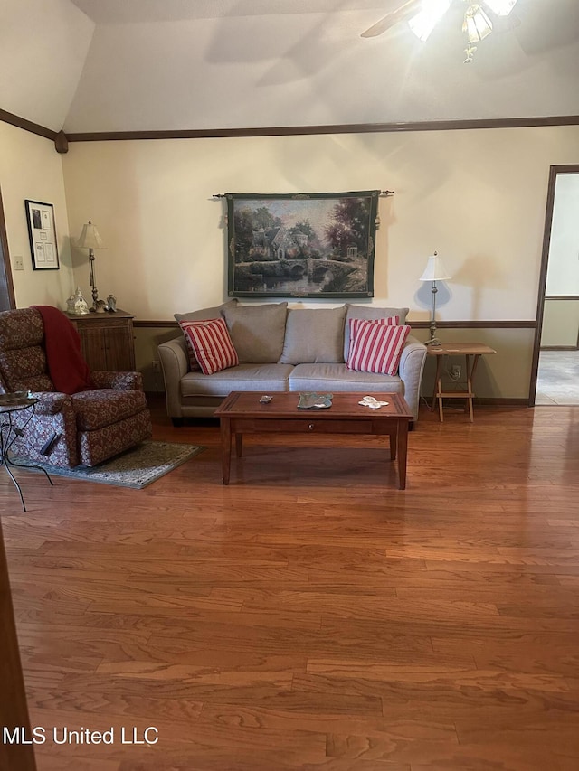 5875 White Ridge Cir W, Olive Branch, MS 38654 - living area with ceiling fan, wood finished floors, vaulted ceiling, crown molding, and baseboards