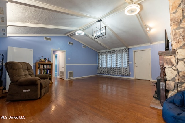 living area featuring lofted ceiling with beams, wood-type flooring, and crown molding